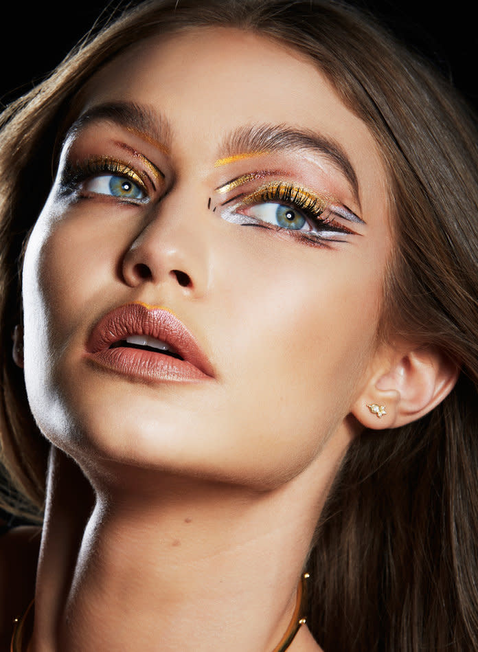 Gigi Hadid just wore the most epic metallic sunset eye makeup. Click here to see the exact products that were used to create the look, along with more info on the inspiration and the artist behind the look.