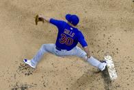 Chicago Cubs starting pitcher Alec Mills throws during the first inning of a baseball game against the Milwaukee Brewers Tuesday, April 13, 2021, in Milwaukee. (AP Photo/Morry Gash)