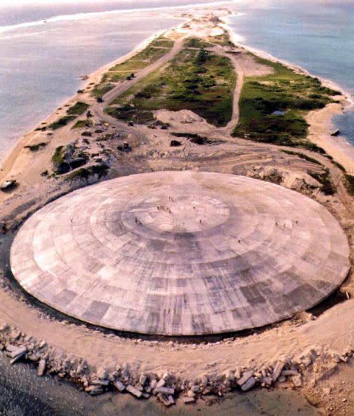 A concrete dome, called 'The Tomb' by locals, caps radioactive waste from 1940s nuclear testing on low-lying Renit Island in the Marshall Islands.