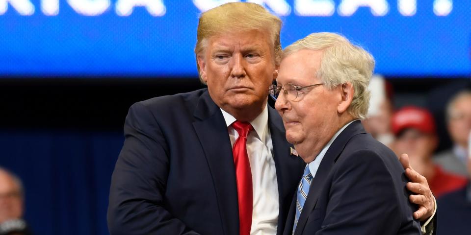 President Donald Trump, left, hugs Senate Majority Leader Mitch McConnell of Ky., right, as he comes up on stage during a campaign rally in Lexington, Ky., Monday, Nov. 4, 2019.  (AP Photo/Susan Walsh)