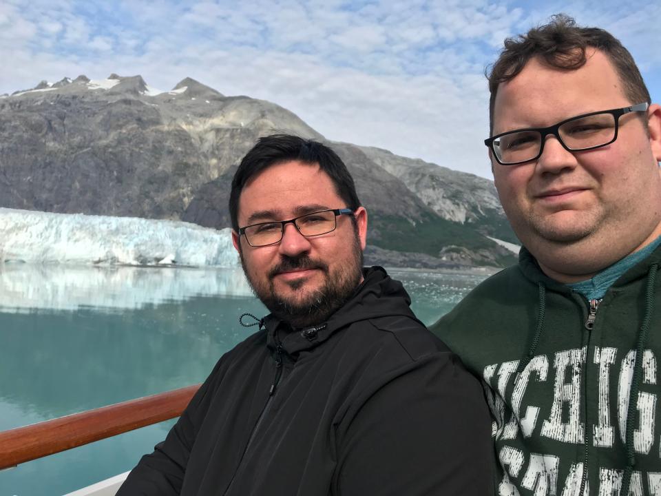 Matt Waitt, right, pictured with his husband, David Haines, has been on five cruises.