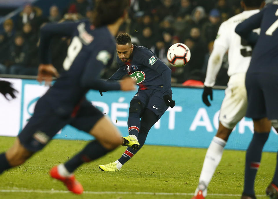 PSG's Neymar kicks the ball during the French Cup soccer match between Paris Saint Germain and Strasbourg at the Parc des Princes stadium in Paris, Wednesday, Jan. 23, 2019. (AP Photo/Michel Euler)