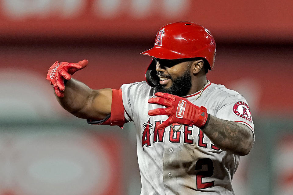 Los Angeles Angels' Luis Rengifo celebrates on second aftar hitting a two-run double during the seventh inning of a baseball game against the Kansas City Royals Tuesday, July 26, 2022, in Kansas City, Mo. (AP Photo/Charlie Riedel)