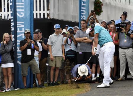 Aug 11, 2017; Charlotte, NC, USA; Hideki Matsuyama plays from next to the cart path on the 16th hole during the second round of the 2017 PGA Championship at Quail Hollow Club. Mandatory Credit: Michael Madrid-USA TODAY Sports