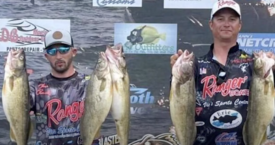 Chase Cominsky and Jake Runyan pose with the five fish they thought would win them team of the year in the Lake Erie Walleye Trail tournament series. 