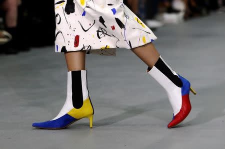 A model presents a creation at the Teatum Jones catwalk show during London Fashion Week Spring/Summer 2017 in London, Britain September 16, 2016. REUTERS/Neil Hall