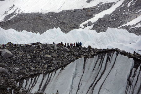 File picture shows trekkers standing in Everest Base camp in Solukhumbu District, Nepal