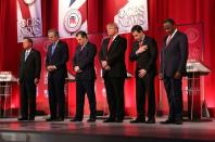 Republican presidential candidates observe a moment of silence for US Supreme Court Justice Antonin Scalia, during a CBS News GOP Debate at the Peace Center in Greenville, South Carolina, on February 13, 2016