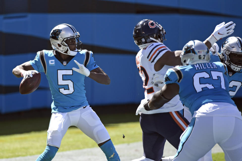 Carolina Panthers quarterback Teddy Bridgewater (5) looks to pass against the Chicago Bears during the first half of an NFL football game in Charlotte, N.C., Sunday, Oct. 18, 2020. (AP Photo/Mike McCarn)