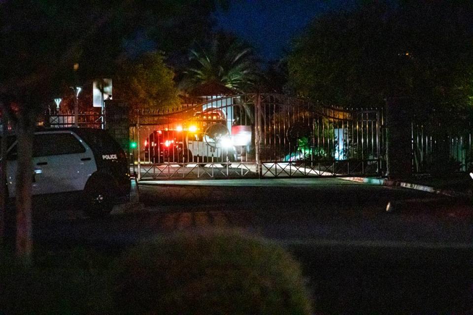 Police close off entrance to apartment complex in northwest Fresno where a vehicle involved in a fatal hit-and-run was found in the parking lot on Friday, May 13, 2022.