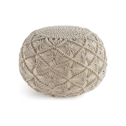 circular pouf ottoman against white background
