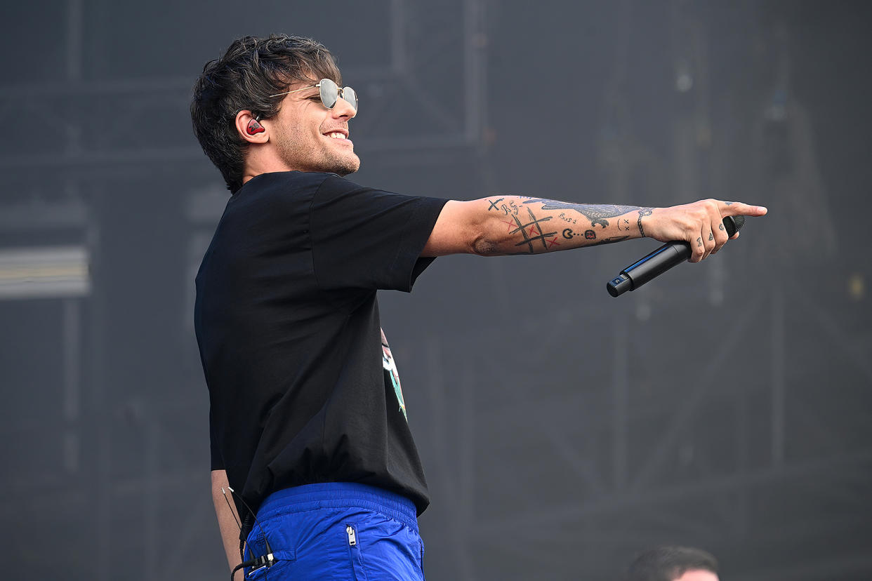 One Direction’s Louis Tomlinson Brought a TV to Glastonbury to Watch a Soccer Match