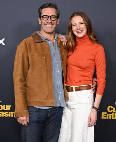 <p>Axelle/Bauer-Griffin/FilmMagic</p> Jon Hamm (left) and Anna Osceola