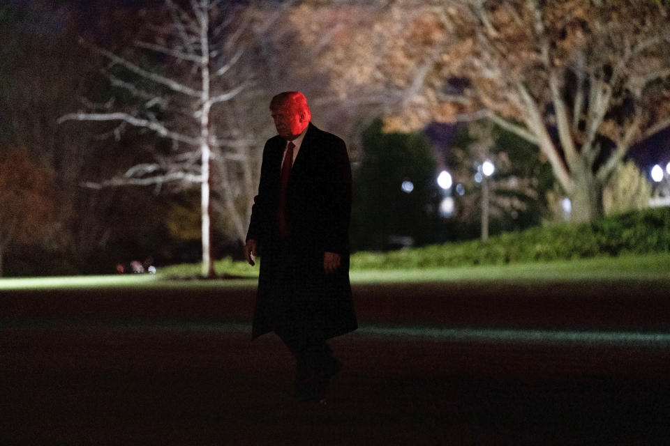 President Donald Trump walks on the South Lawn of the White House in Washington, Saturday, Dec. 12, 2020, after stepping off Marine One. Trump is returning from the Army-Navy Game at the U.S. Military Academy in West Point, N.Y. (AP Photo/Patrick Semansky)