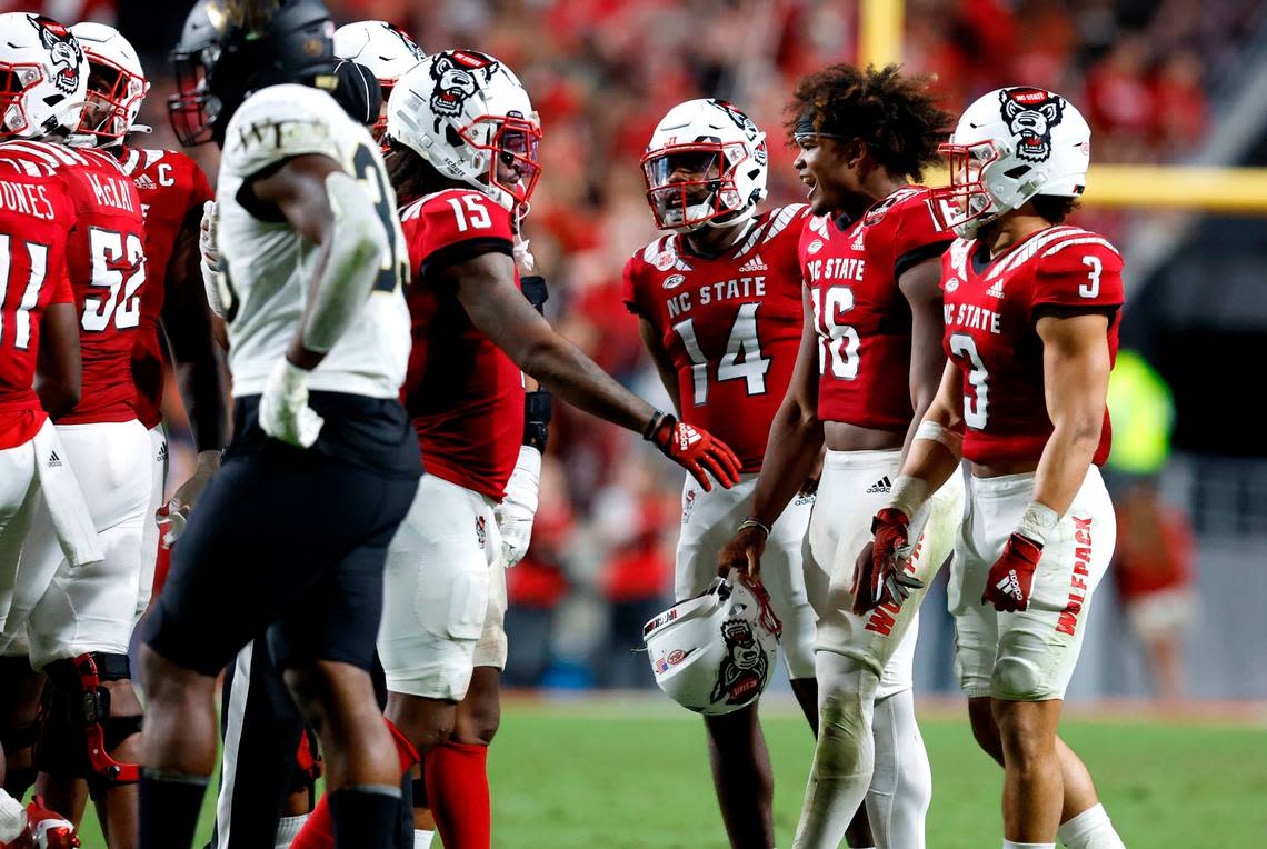 N.C. State quarterback MJ Morris (16) looks back at Wake Forest after he was kicked after being tackled during the second half of N.C. State’s 30-21 victory over Wake Forest at Carter-Finley Stadium in Raleigh, N.C., Saturday, Nov. 5, 2022.