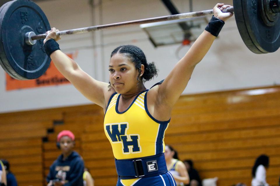 Winter Haven's Alyvia Logan completes a lift at 154 pounds. She won her weight class in both the Olympics and Traditional competitions on Thursday at the Class 3A, District 10 girls weightlifting meet.