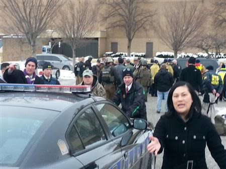 Police car is seen at mall in Columbia, Maryland, January 25, 2014. REUTERS/DCMediagroup/Robert Brune