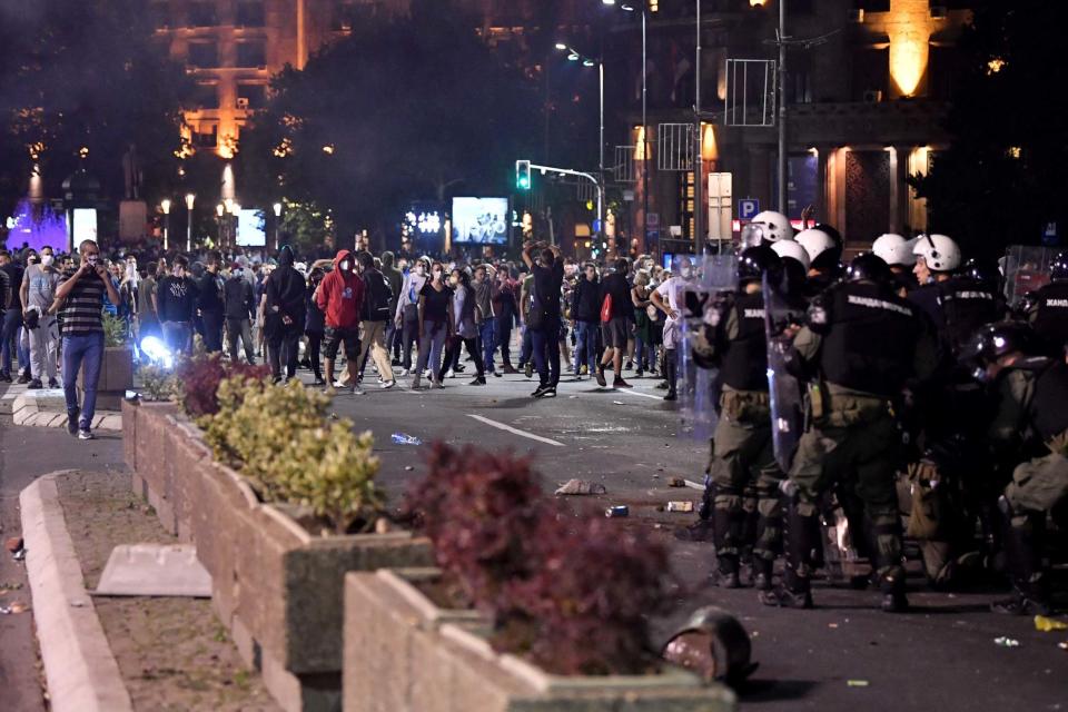 Protesters clashed with police on Tuesday night (AFP via Getty Images)