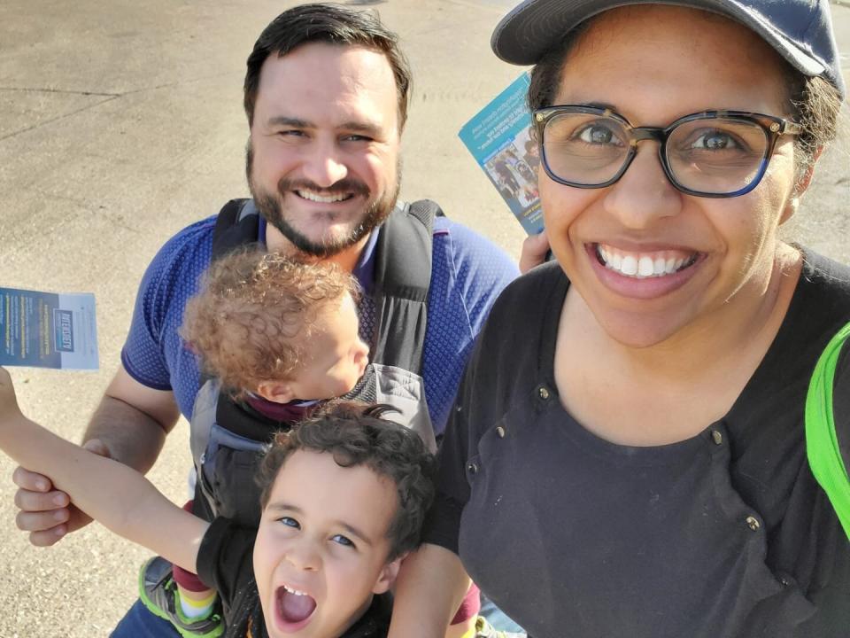 Candace Valenzuela with her husband Andy and two children door-knocking for her campaign in February. (Photo: Candace Valenzuela)