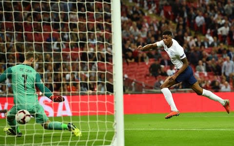 Marcus Rashford puts England ahead  - Credit: Getty images