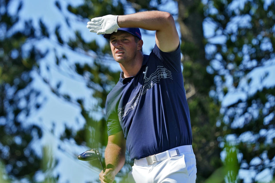 Bryson DeChambeau watches his shot from the third tee during the second round of the Tournament of Champions golf event, Friday, Jan. 7, 2022, at Kapalua Plantation Course in Kapalua, Hawaii. (AP Photo/Matt York)