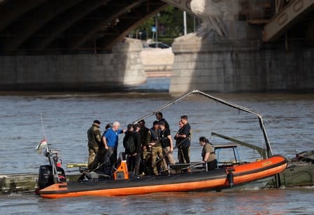 A search operations continue near the Margaret bridge on the Danube river after a boat carrying South Korean tourists capsized in Budapest