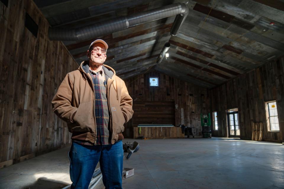 Paul Rasch at the new Wilson's Orchard location in Cumming, built with reclaimed barn wood.