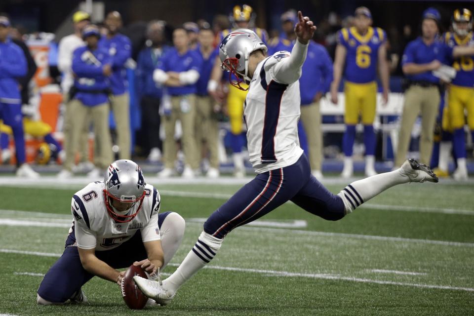 FILE - New England Patriots' Stephen Gostkowski (3) kicks a field goal as Ryan Allen (6) holds during the second half of the NFL Super Bowl 53 football game against the Los Angeles Rams, Sunday, Feb. 3, 2019, in Atlanta. The Tennessee Titans have made a switch at kicker agreeing to terms with veteran Stephen Gostkowski and waiving Greg Joseph. The Titans announced the move Thursday morning, Sept. 3, 2020. (AP Photo/Mark Humphrey, File)