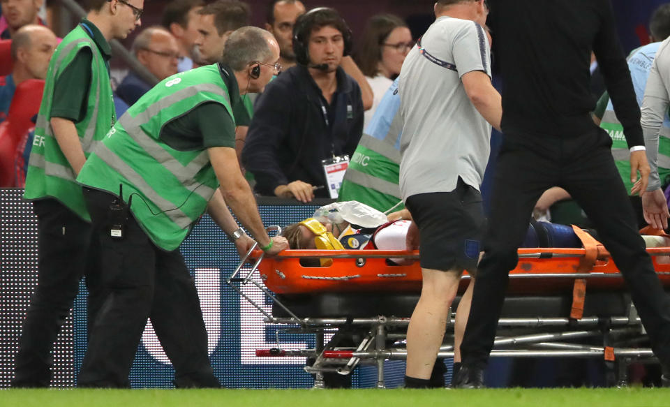 Shaw was attended by 10 medical staff before being wheeled off on a stretcher