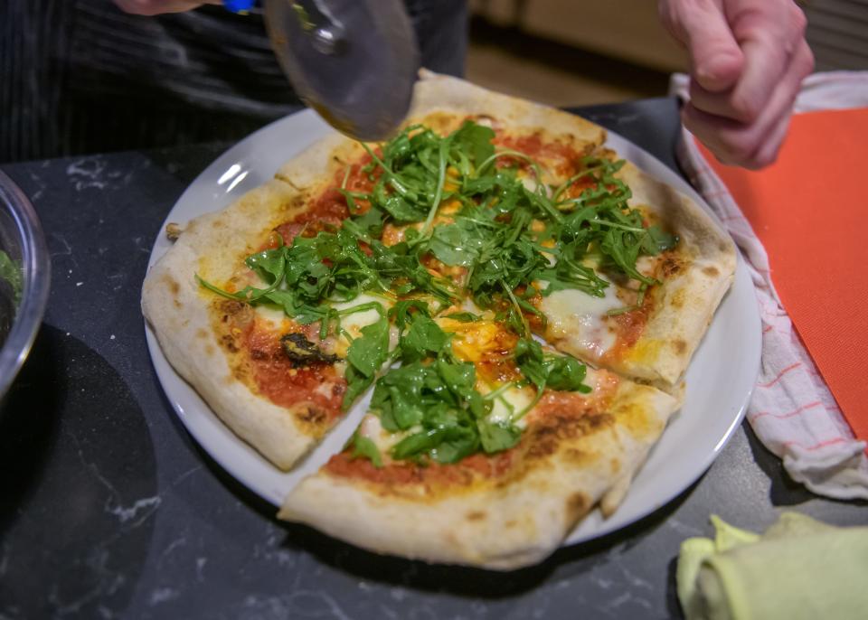 Wendy Puff Pizzeria + Pub features eleven different pizzas, or "puffs" as the Mayo brothers call them, including this one known as the Red Devil, all created by head chef Bob Mayo. The restaurant also offers a number of creative appetizers and salads.