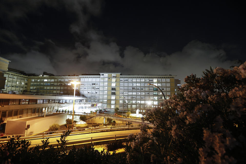 A view at night of the Gemelli Polyclinic in Rome, where Pope Francis has been hospitalized for a scheduled surgery, Sunday, July 4, 2021. Pope Francis “reacted well” to planned intestinal surgery Sunday evening at a Rome hospital, the Vatican announced. In a statement late Sunday, a Holy See spokesman, Matteo Bruni, said the 84-year-old Francis had general anesthesia during the surgery necessitated by a stenosis, or narrowing, of the sigmoid portion of the large intestine. (AP Photo/Riccardo De Luca)