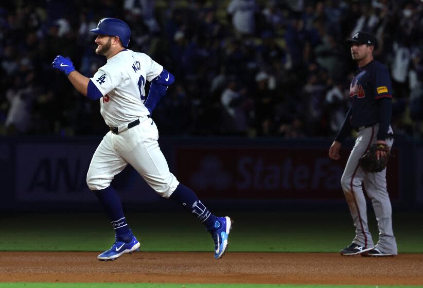 LOS ANGELES, CALIFORNIA-May 4, 2024- Dodgers Max Muncy round the bases after hitting.