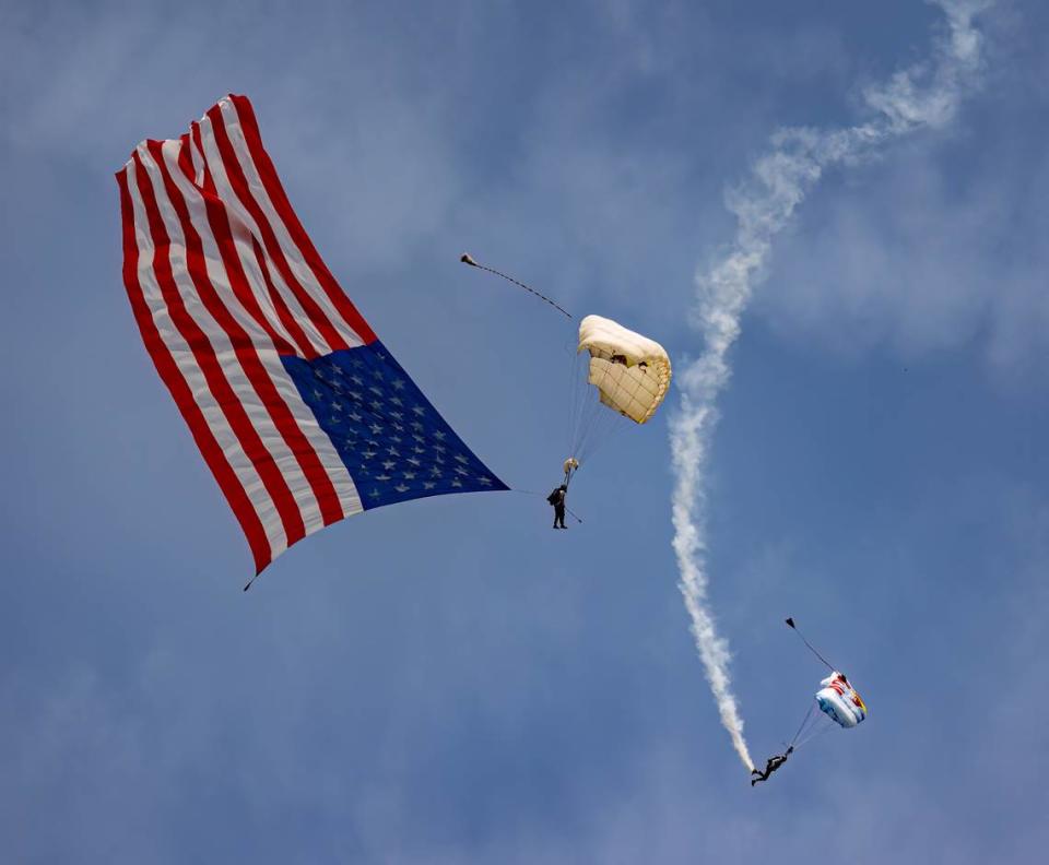 Red Bull sky divers perform at during the Scott Air Force Base Airshow. The airshow, at SAFB for the first time since 2017, drew large crowds.