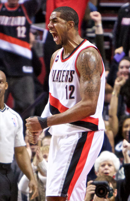 Feb 27, 2015; Portland, OR, USA; Portland Trail Blazers forward LaMarcus Aldridge (12) reacts after making a basket against the Oklahoma City Thunder during the fourth quarter at the Moda Center. (Craig Mitchelldyer-USA TODAY Sports)