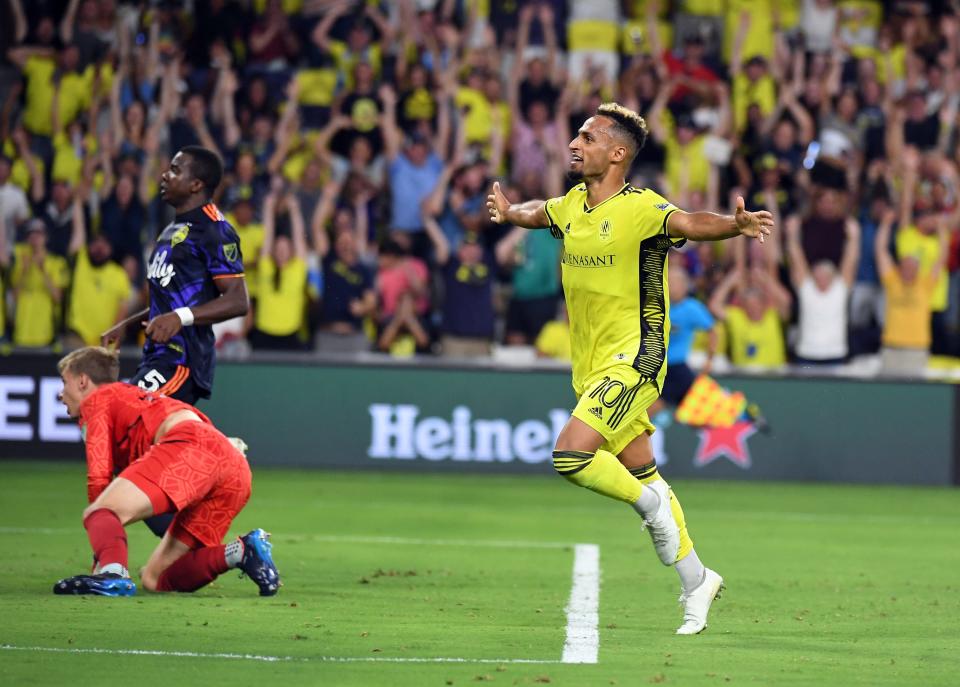 Jul 13, 2022; Nashville, Tennessee, USA; Nashville SC midfielder Hany Mukhtar (10) celebrates after a goal during the first half against the Seattle Sounders at GEODIS Park.