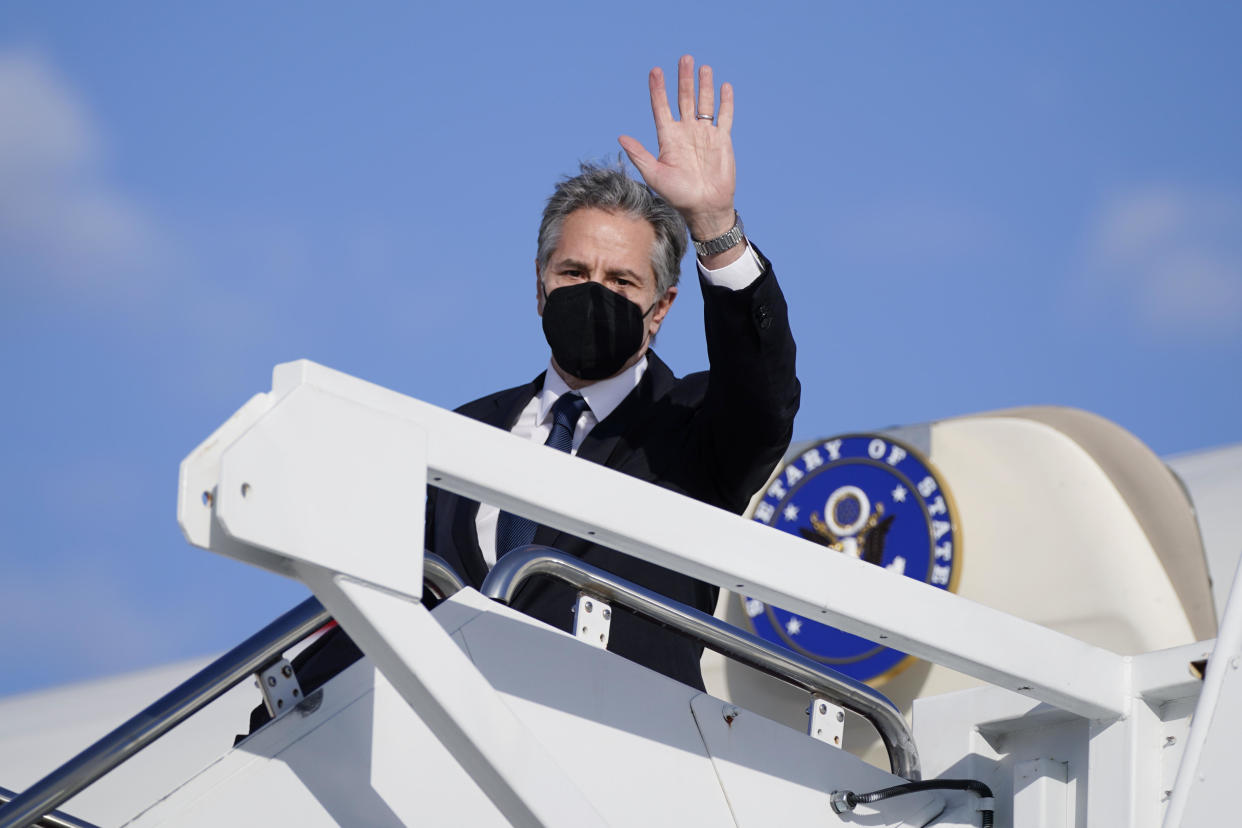 Secretary of State Antony Blinken waves as he departs, Tuesday, Jan. 18, 2022, at Andrews Air Force Base, Md. Blinken is en route to Ukraine, Switzerland, and Germany. / Credit: Alex Brandon / AP