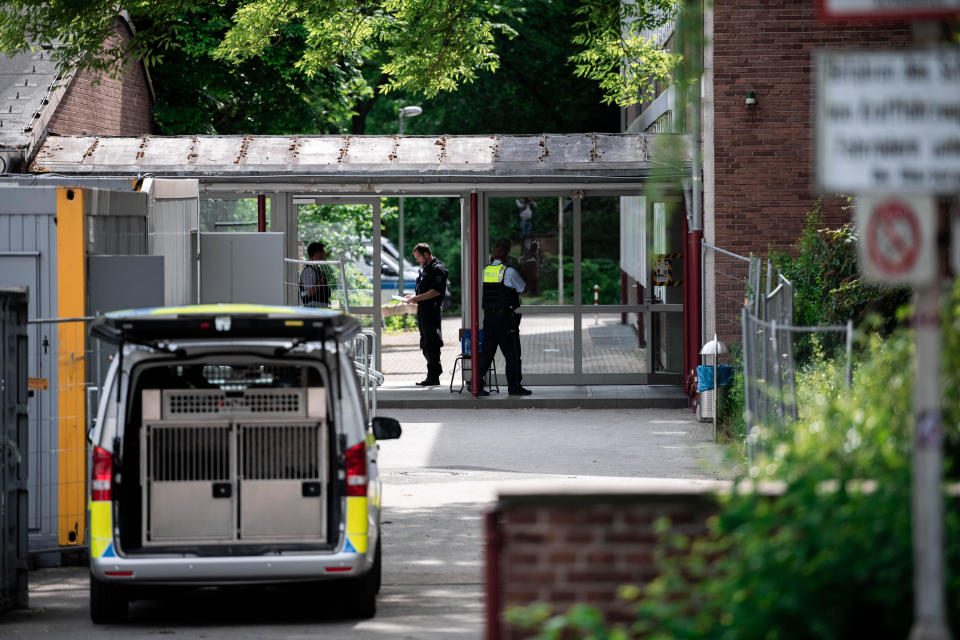 The entrance to a school in Essen, Germany is guarded by police, May 12, 2022. / Credit: Fabian Strauch/picture alliance/Getty