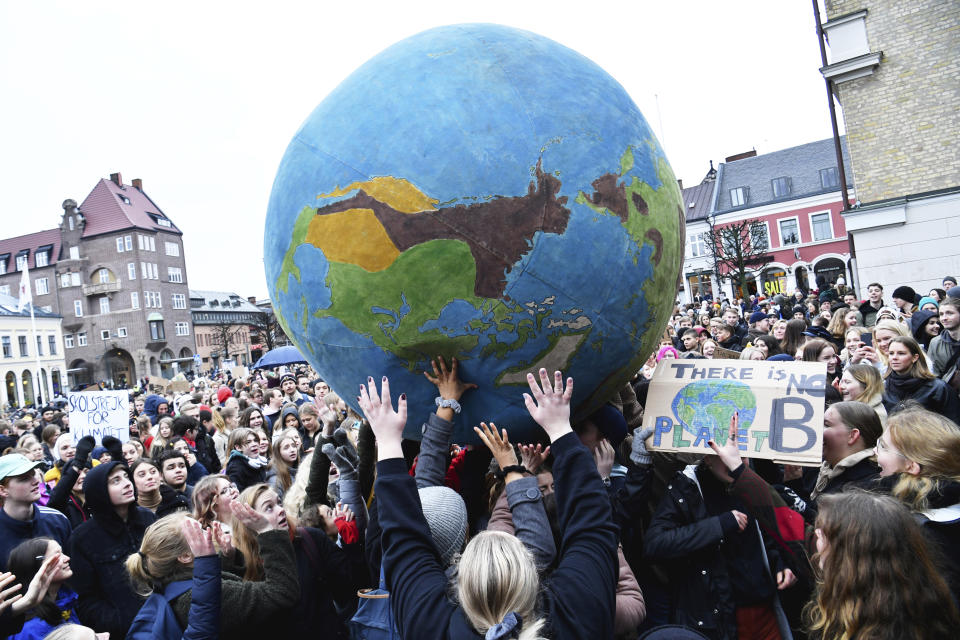 Students participate in a climate protest, at Stortorget in Lund, Sweden, Friday, March 15, 2019. Students worldwide skipped classes Friday to take to the streets to protest their governments' failure to take sufficient action against global warming. (Johan Nilsson /TT News Agency via AP)