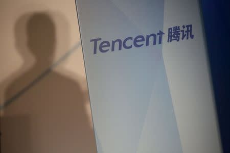 Tencent comany name is displayed at a news conference in Hong Kong, China March 17, 2016. REUTERS/Bobby Yip/Files