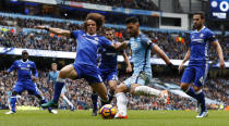 Britain Football Soccer - Manchester City v Chelsea - Premier League - Etihad Stadium - 3/12/16 Manchester City's Sergio Aguero in action with Chelsea's Marcos Alonso Action Images via Reuters / Jason Cairnduff Livepic EDITORIAL USE ONLY. No use with unauthorized audio, video, data, fixture lists, club/league logos or "live" services. Online in-match use limited to 45 images, no video emulation. No use in betting, games or single club/league/player publications. Please contact your account representative for further details.