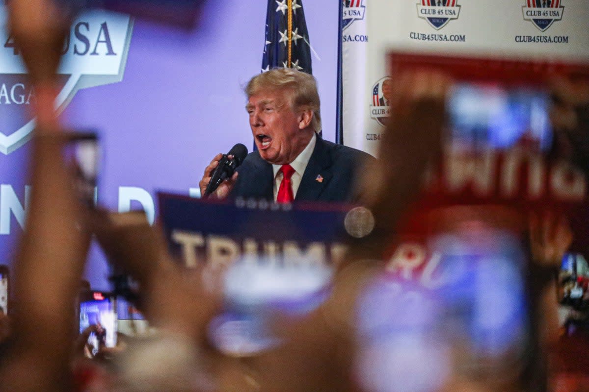 Former US President Donald Trump speaks to supporters during Trump's President Day event at the Hilton Palm Beach Airport in West Palm Beach, Florida, on February 20, 2023 (AFP via Getty Images)