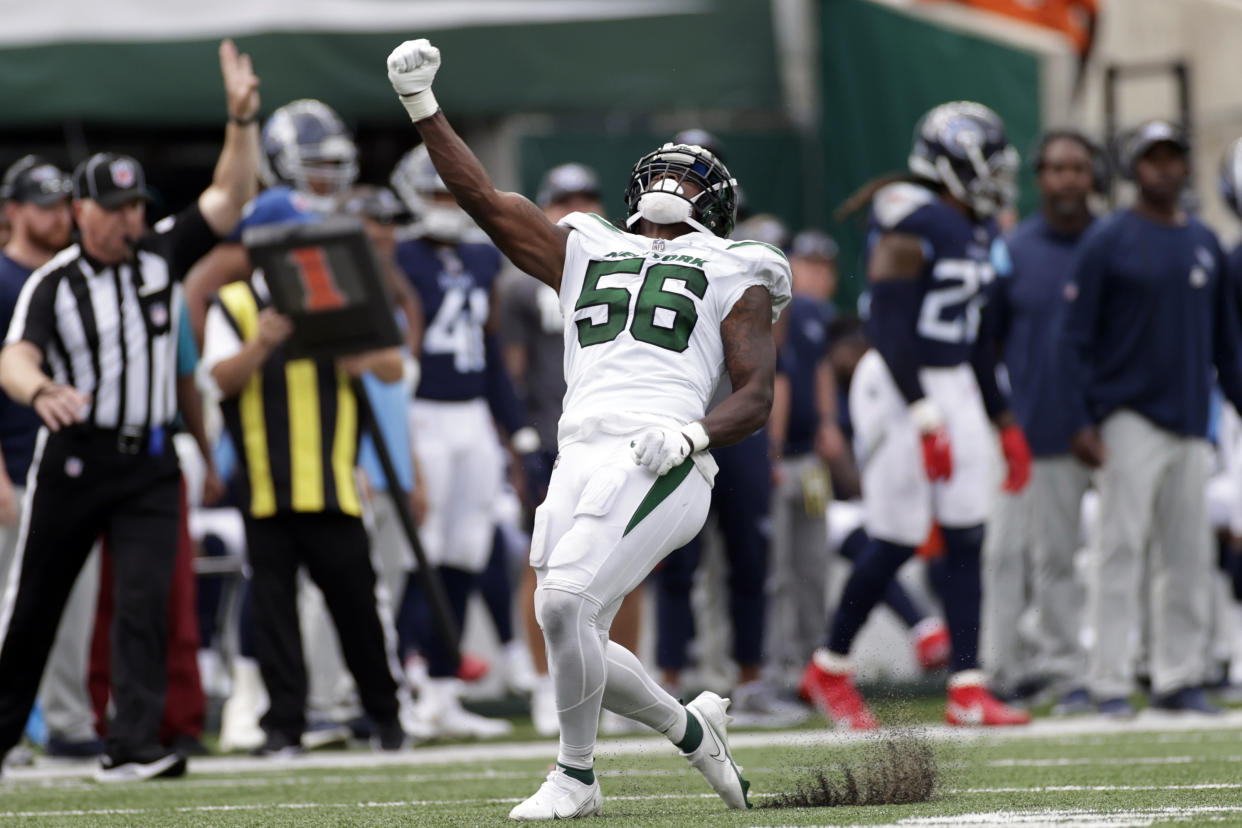 New York Jets outside linebacker Quincy Williams (56) reacts against the Tennessee Titans during an NFL football game, Sunday, Oct. 3, 2021, in East Rutherford, N.J. (AP Photo/Adam Hunger)