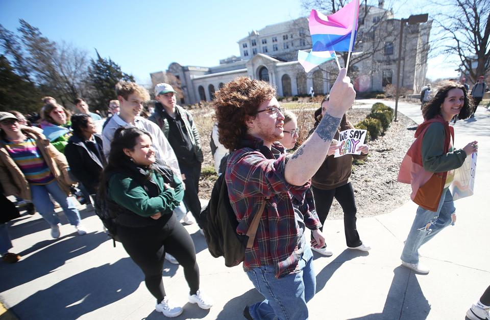 Iowa State University students march to protest bills introduced in the Iowa Legislature targeting LGBTQ people.