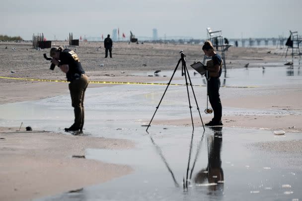 PHOTO: Police work along a stretch of beach at Coney Island which is now a crime scene after a mother is suspected of drowning her children in the ocean on Sept. 12, 2022, in the Brooklyn, New York. (Spencer Platt/Getty Images)