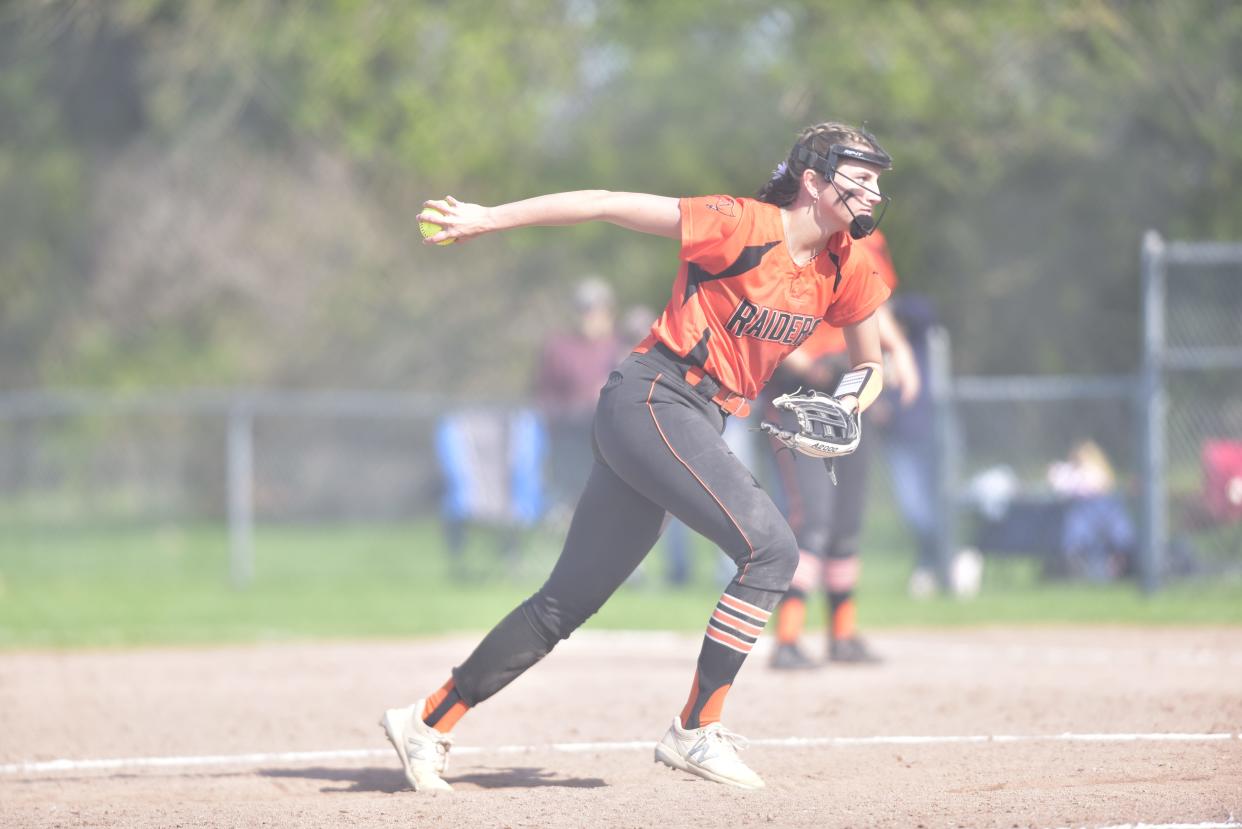 Almont's Lydia LaCavera winds up to throw a pitch during a game last season.