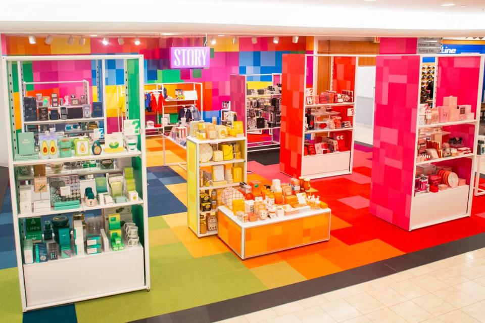 A STORY boutique in a Macy's store, featuring the color theme