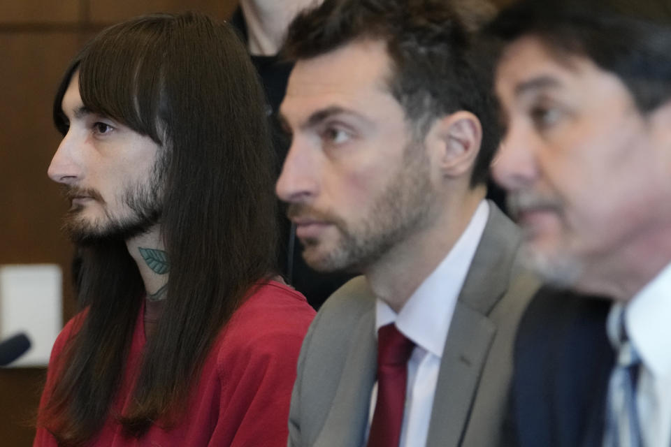 Robert E. Crimo III., left, assistant public defender at Lake County, Anton Trizna, center, and attorney Gregory Ticsay listen to Judge Victoria A. Rossetti during a case management conference at the Lake County Courthouse Monday, Dec. 11, 2023, in Waukegan, Ill. Robert Crimo III, accused of killing seven and wounding dozens more at a Fourth of July parade in 2022, asked a Lake County judge to allow him to continue without the aid of his assistant public defenders and invoked his right to a speedy trial. (AP Photo/Nam Y. Huh, Pool)