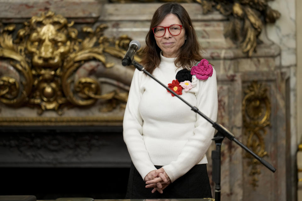 Argentina´s new Economy Minister Silvina Batakis smiles before being sworn into office at the government house in Buenos Aires, Argentina, Monday, July 4, 2022. Batakis will replace Martín Guzmán who quit unexpectedly Saturday, posting a seven-page resignation letter on Twitter. (AP Photo/Natacha Pisarenko)