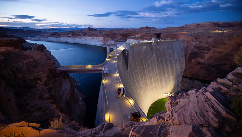 Glen Canyon Dam holds back Lake Powell in Page, Ariz., on Monday, July 18, 2022.