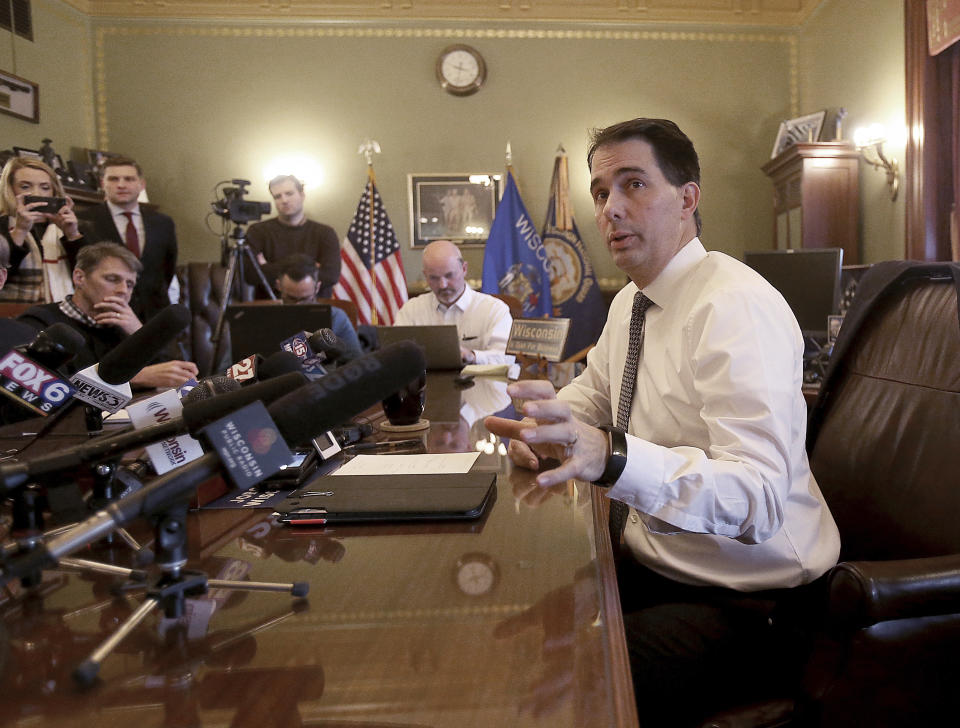 Addressing members of the media for the first time after failing to win re-election in the 2018 race, Wisconsin Governor Scott Walker addresses members of the media from his office in Madison, Wis., Thursday, Nov. 15, 2018. (John Hart/Wisconsin State Journal via AP)
